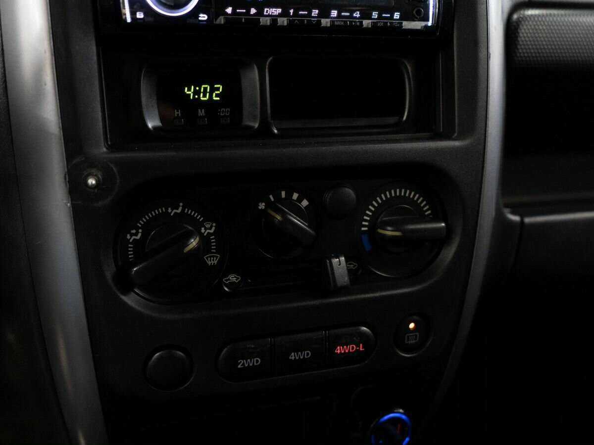 Suzuki Jimny, 2009 - 157 804 км. | Фото №8