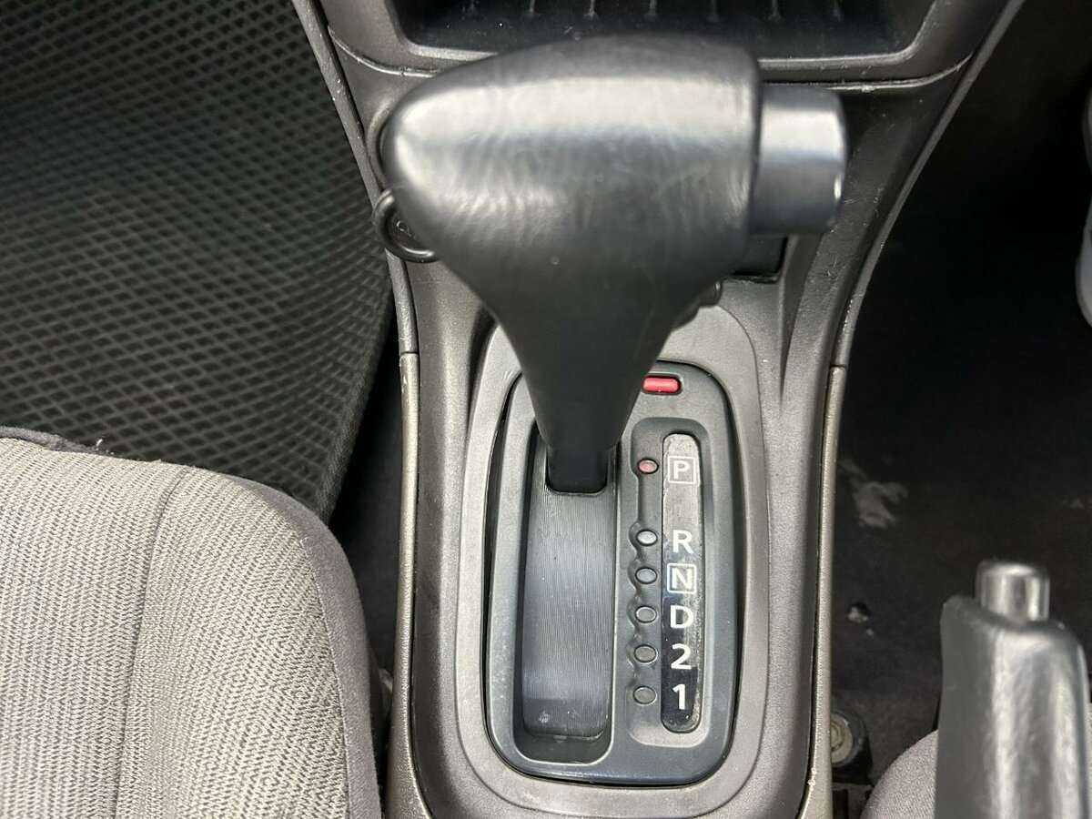 Nissan Sunny, 2004 Фото №13