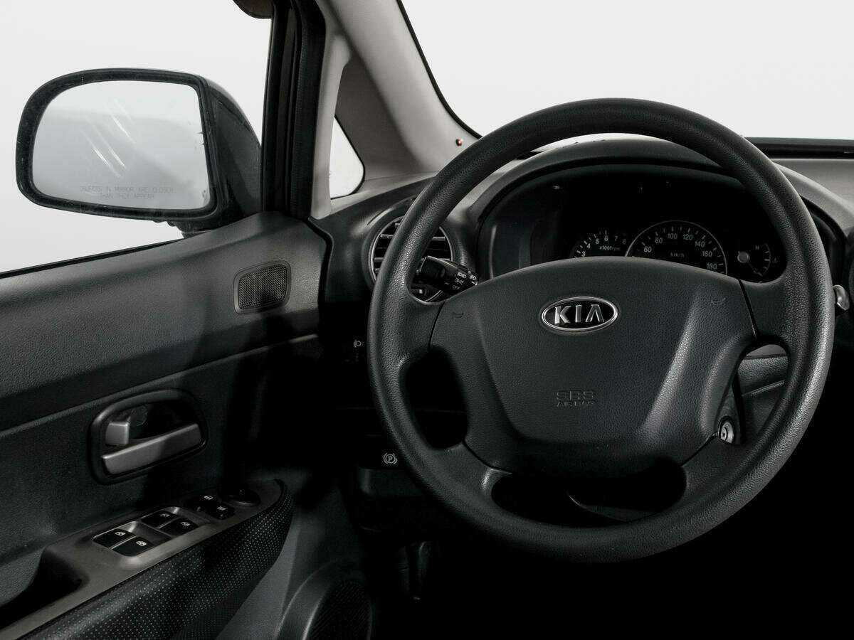 Kia Carens, 2009 Фото №14