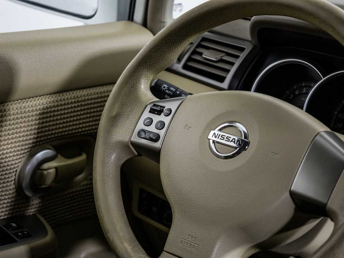 Nissan Tiida, 2011 Фото №14