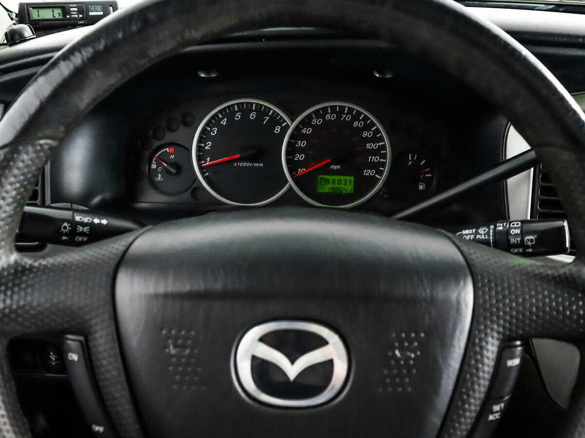 Mazda Tribute, 2003 Фото №16