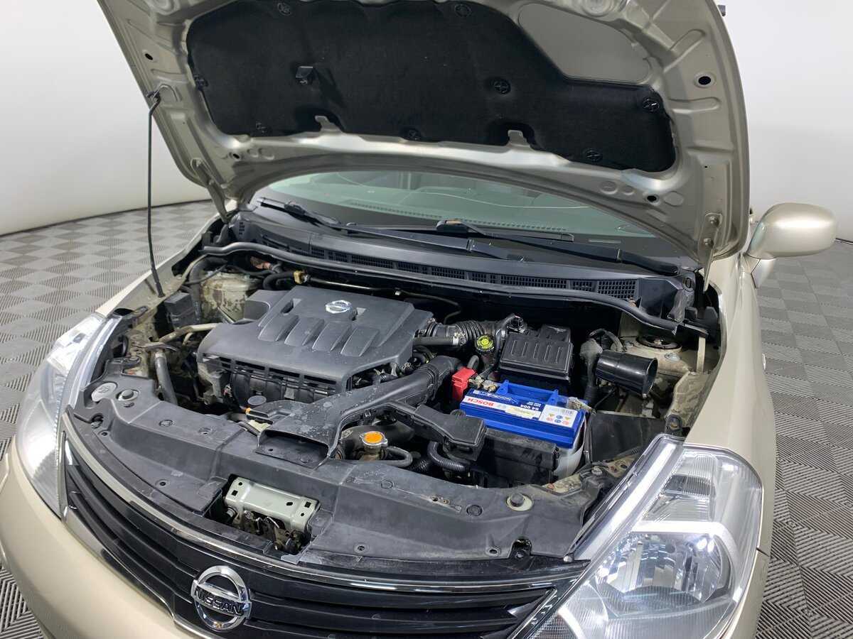 Nissan Tiida, 2010 Фото №11