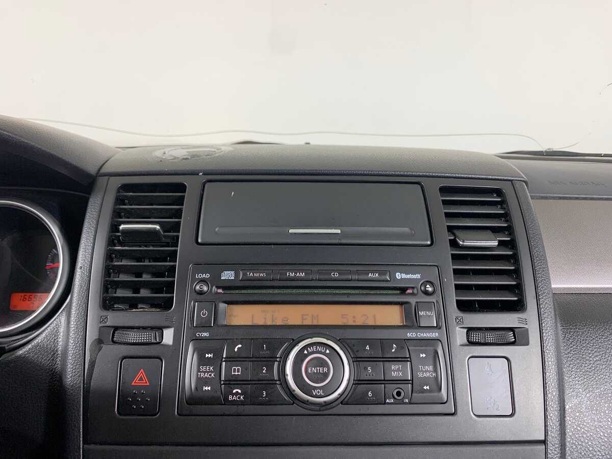 Nissan Tiida, 2011 Фото №16