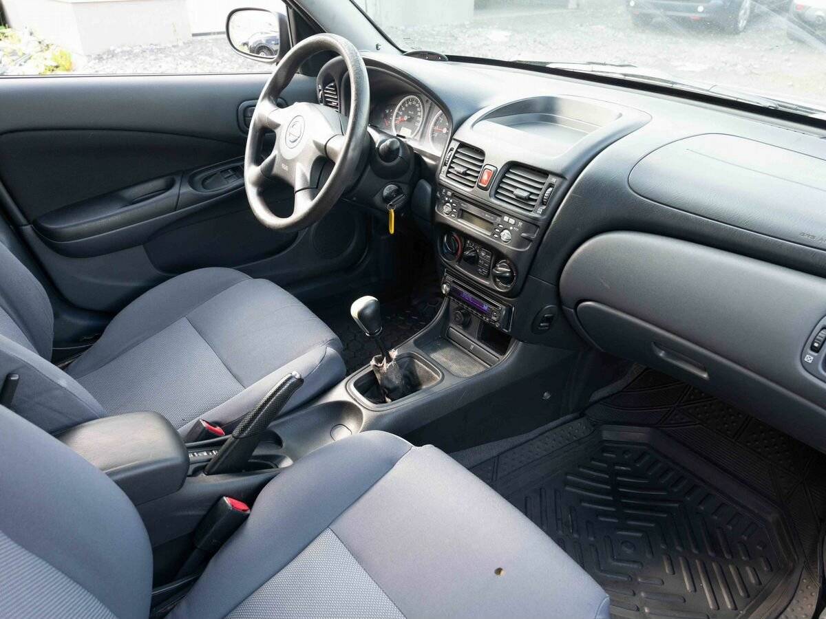 Nissan Almera, 2004 Фото №11