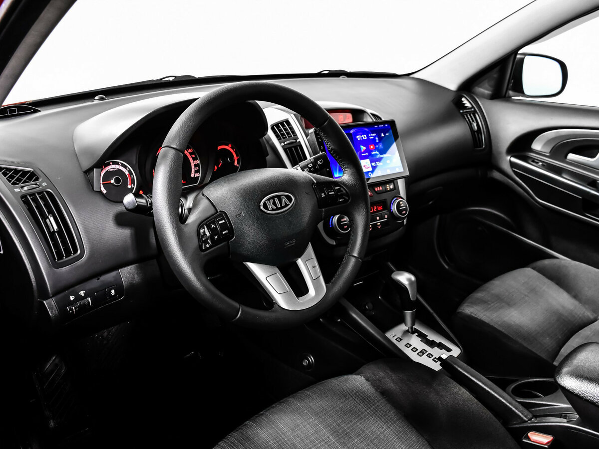 Kia Ceed I Рестайлинг, 2011 Фото №11